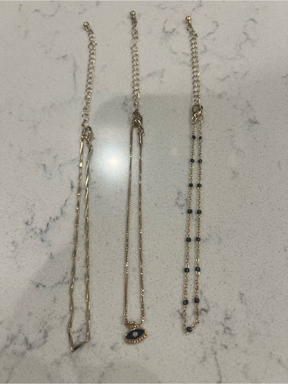 Gold Tone Layered Ankle Bracelet Set with Black Accents
